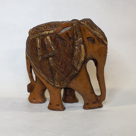 Elephant statue made of teak wood: Hand-carved symbol of luck and strength