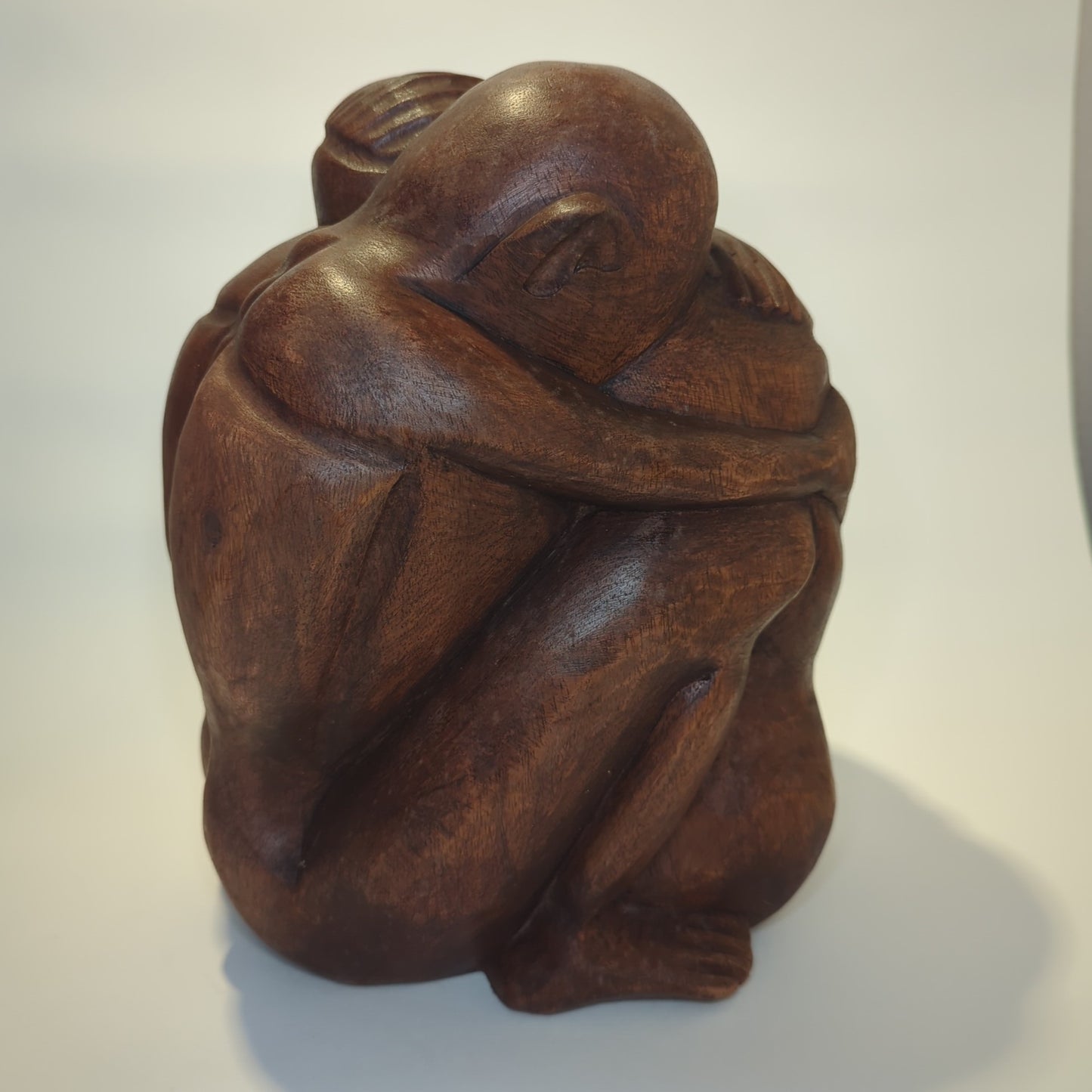 Teakwood couple: Hand-carved harmony from Bali