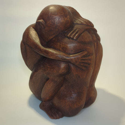 Teakwood couple: Hand-carved harmony from Bali