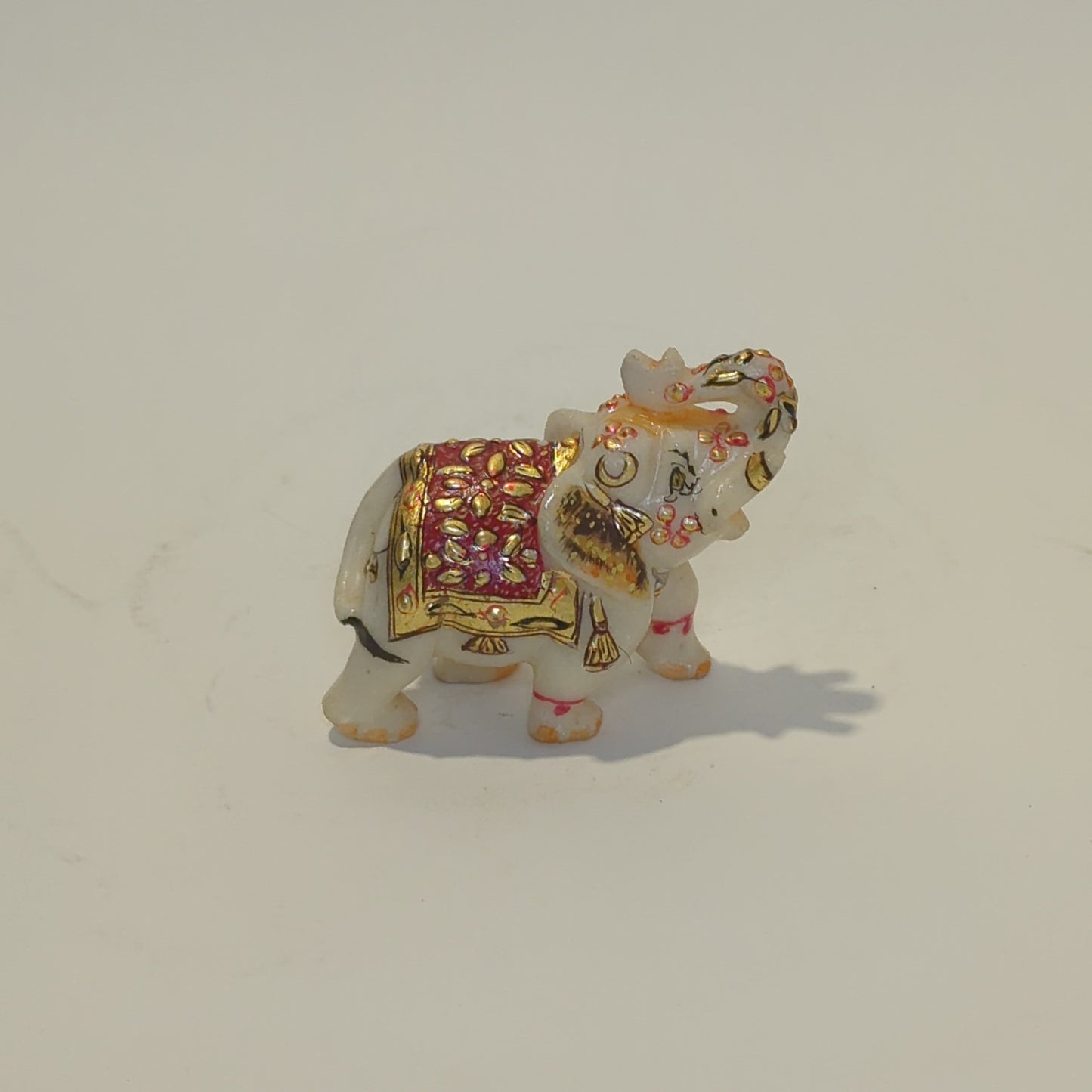 Hand-painted marble elephant: A colorful, unique piece of Indian craftsmanship
