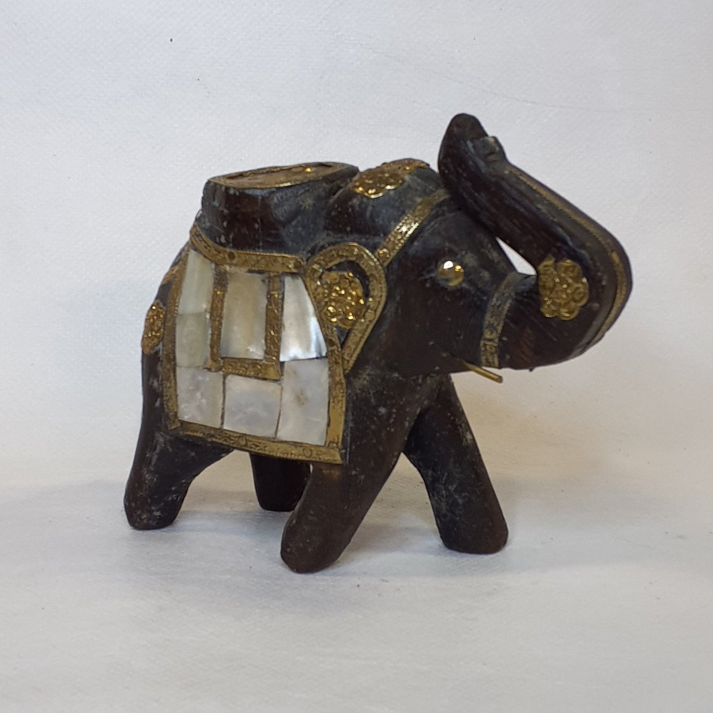 Wooden elephant with precious fittings: Hand-carved unique piece with mother-of-pearl