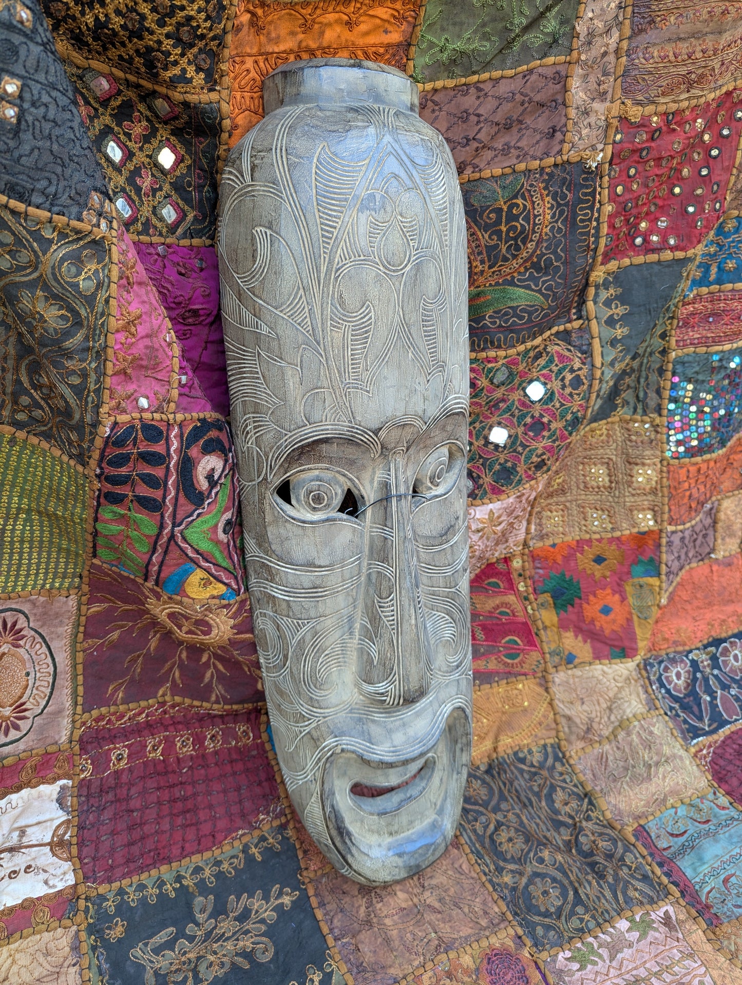 Hand-carved wooden mask from Thailand: A unique piece of Thai culture and craftsmanship